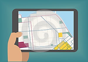 Digital mobile maps concept as illustration with hand holding tablet photo