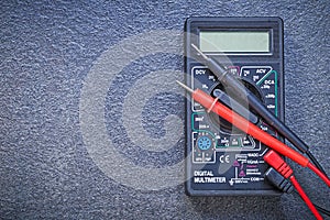 Digital multimeter electrical tester on black background electri