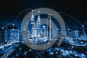 Digital network connection lines of Kuala Lumpur Downtown, Malaysia. Financial district and business centers in smart city in