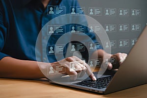 Digital Networking Interface with Highlighted User Icon and Laptop Typing