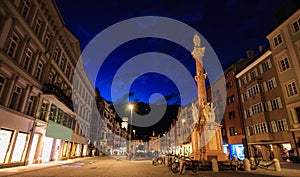 Digital Oil Painting, Beautiful twilight view of Our Lady statue in Innsbruck old town shopping street, Innsbruck, Tyrol, Austria