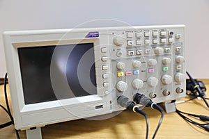 The digital oscilloscope on the desk
