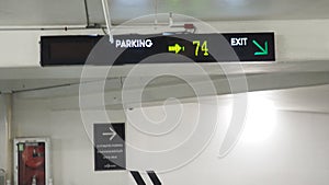 Digital parking signs with showed available space by yellow color