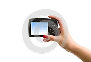 Digital photo camera in hand