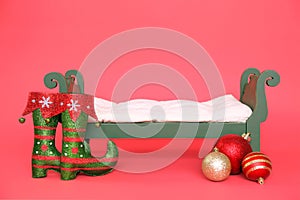 Digital Photography Background Of Green Vintage Christmas Baby Bed Isolated On Red photo