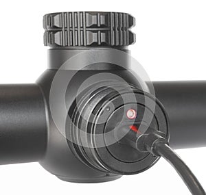 Digital riflescope being charged