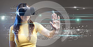 Digital screen with young woman with virtual reality glasses