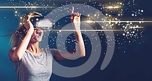 Digital Screen with young woman with VR