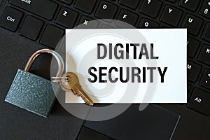 Digital security - the inscription on the card and the lock on the background of the keyboard