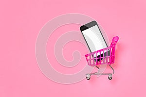 Digital shopping pink concept sales mobile online shopping trolley isolated screen smartphone mockup. E store online