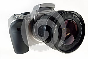 Digital SLR camera with attached zoom lens