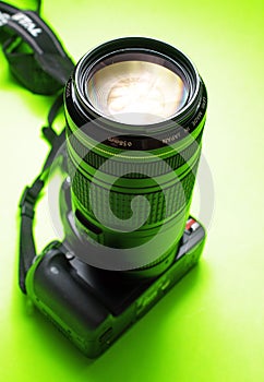 A digital SLR with a telephoto