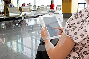 Digital tablet or e-reader at airport