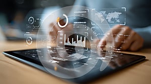 Digital tablet with futuristic data analytics interface showing charts and graphs, hands interacting with virtual screen modern