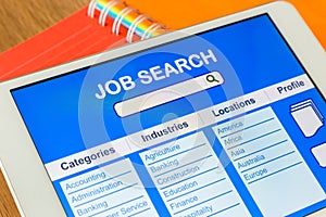 Digital tablet pc showing user interface of online job search