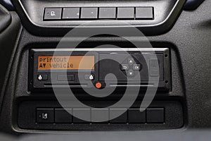 Digital tachograph display reads Printout Vehicle. No personal data. Tachograph in a van photo
