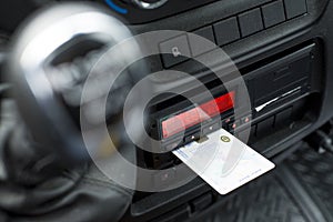 Digital tachograph in a van from an angle with ejected driver card