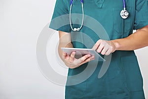 Digital technology with Doctor using tablet with white background.