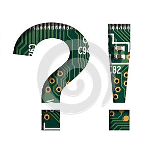 Digital technology font. Exclamation and question marks cut out of white on the printed digital circuit board with microprocessors