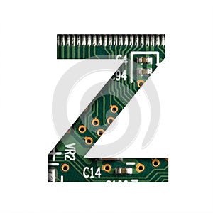 Digital technology font. The letter Z cut out of white on the printed digital circuit board with microprocessors and