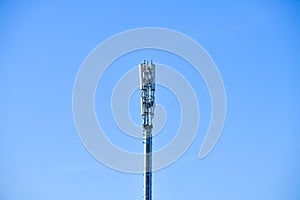 Digital telephone antenna. GSM tower on a blue background. 5g 4g