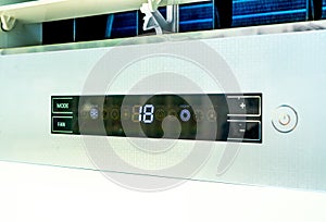 Digital Temperature Control Panel of Air Conditioner with 18 Degree Celsius and Mode