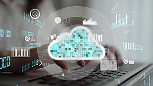 Digital Transformation Concept with Cloud Computing, Data Visualization, and Analytics on Laptop in Modern Workspace