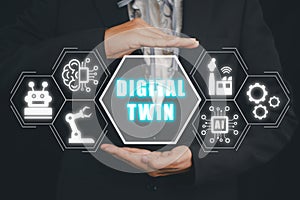 Digital twin business and industrial process modelling, Business woman hand holding digital twin icon on virtual screen,