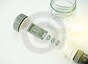 Digital waterproof with temp pocket tester,pH meter,chemistry equipment isolated on a white background