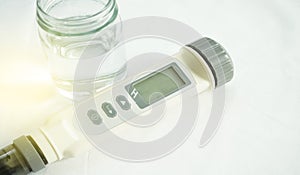 Digital waterproof with temp pocket tester,pH meter,chemistry equipment isolated on a white background