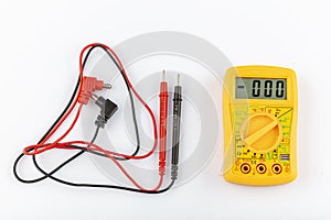 Digital yellow multimeter meter isolated to check the resistance on a white background