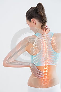 Digitally generated image of female suffering from muscle pain