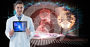 Digitally generated image of male doctor showing digital tablet against human skeleton in background