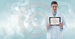 Digitally generated image of male doctor showing DNA structure in tablet computer against organism g