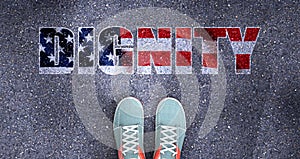 Dignity and politics in the USA, symbolized as a person standing in front of the phrase Dignity  Dignity is related to politics