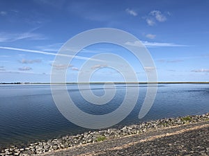 Dike at the IJsselmeer and around the village Cornwerd