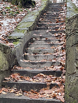 dilapidated antique staircase in the park, keeping many secrets