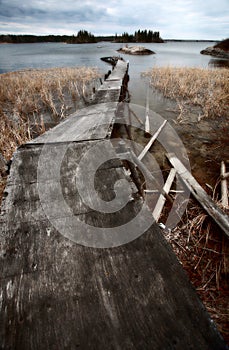 Dilapidated dock on Reed Lake in Northern Manitoba photo