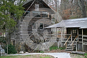 Dilapidated Gristmill Next to Shed