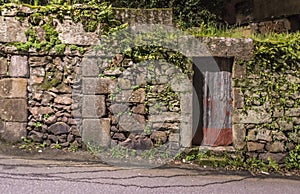 Dilapidated metal door. photo