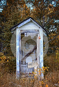 Dilapidated Outhouse photo