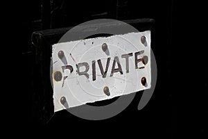 Dilapidated private sign