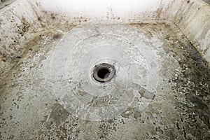 Dilapidated shower hole