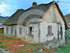 Dilapidated small lonesome house