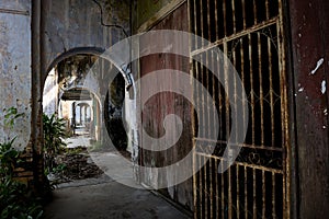 Dilapidated vintage corridor in the abandoned tin mining town of Jalan Papan in the outskirts of the city of Pusing, Perak, Malays