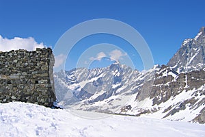 Dilapidated watchtower at the top of the mountain photo