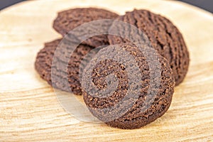 Dilicious chocolate cookies on woogen plate