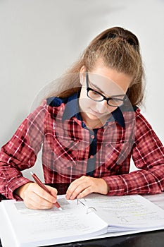 Diligent female student learning for exam