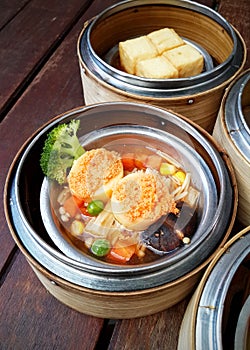 Dim sum in bamboo steamer