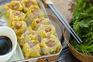 Dim Sum, Chinese Food, chinese steamed dumpling on white plate.